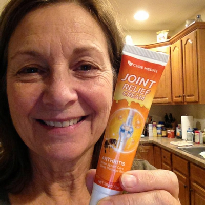 Customer holding Joint Relief Cream